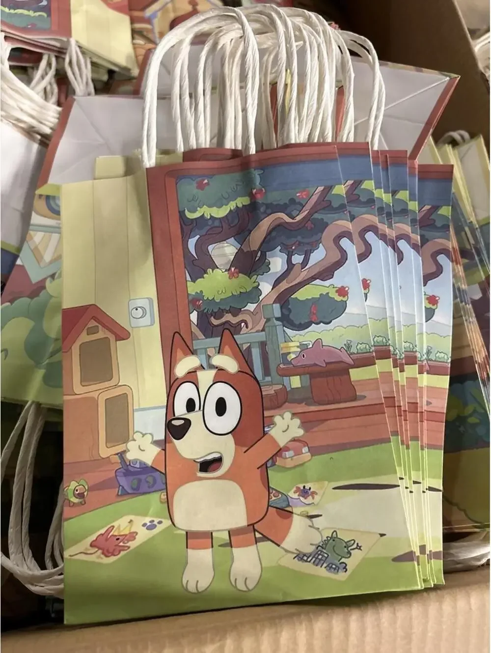 10 of Bluey tv show party gift bags with Bingo the dog character